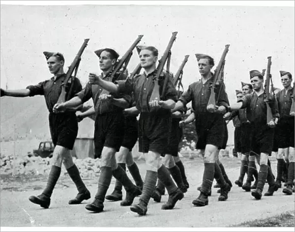 Soldiers marching in shorts in Wales, September 1939