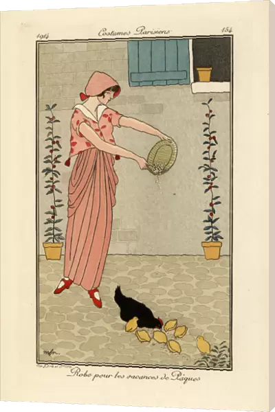 Woman feeding chickens in dress for the Easter holiday
