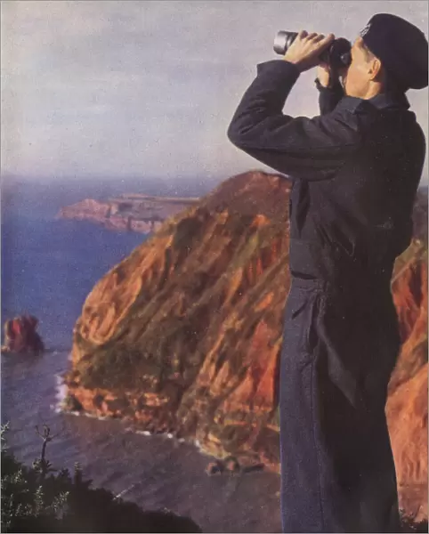 Member of the Royal Observer Corps on the cliffs of England