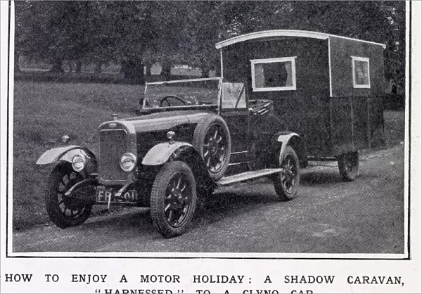 A Shadow Caravan (open), harnessed to a Clyno Car