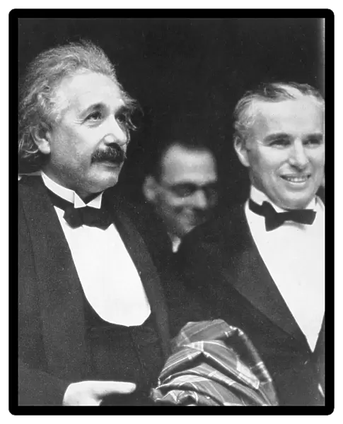 Albert Einstein with Charlie Chaplin at movie premiere