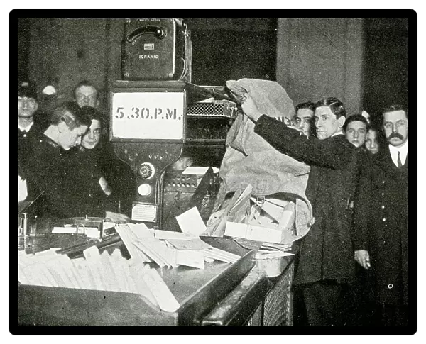 Letters arrive for sorting at the London General Post Office