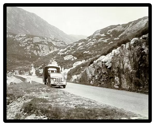 Early Caravan trundling through the Pass of Glencoe