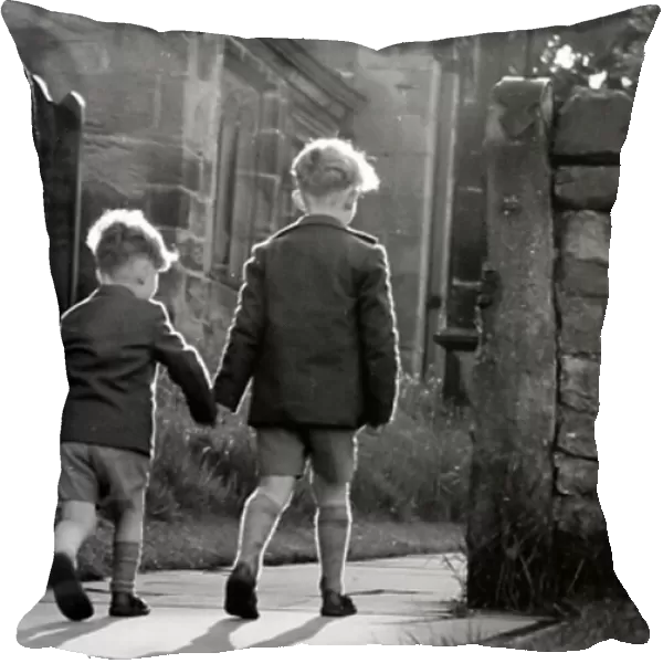Brothers holding hands in the 1930s