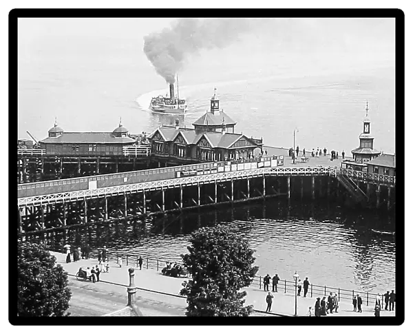 Paddle steamer arriving at Dunoon Pier