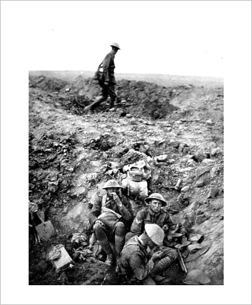 New Zealand soldiers resting in shell-hole