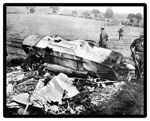 A gondola, part of a crashed zeppelin, being examined by the