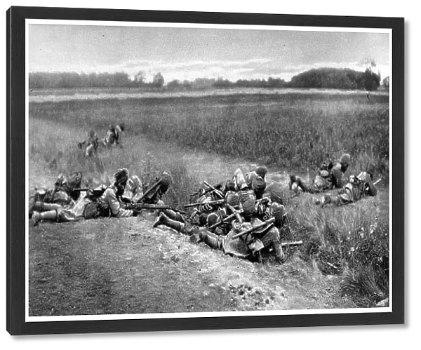On duty with the allies in France: Indian Infantry taking cover while attacking