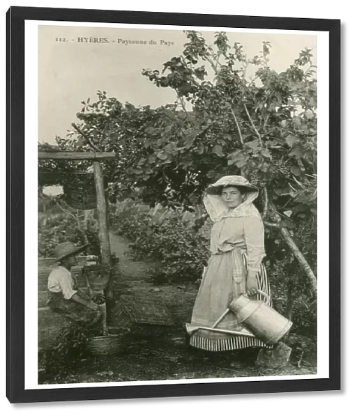 Hyeres, France - Countrywoman with watering can