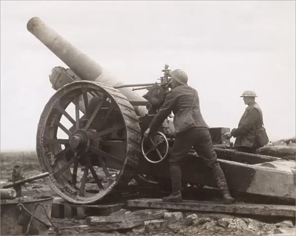 Sighting a British 8 inch Howitzer, France, WW1