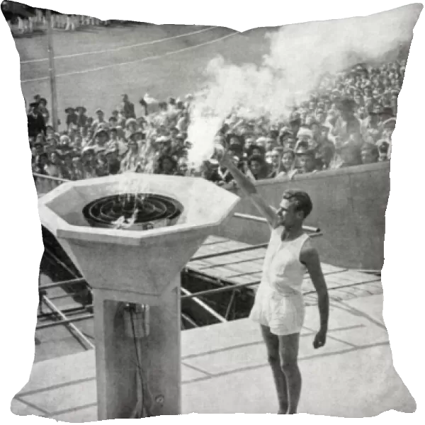 John Mark lights the Olympic bowl, opening ceremony, 1948