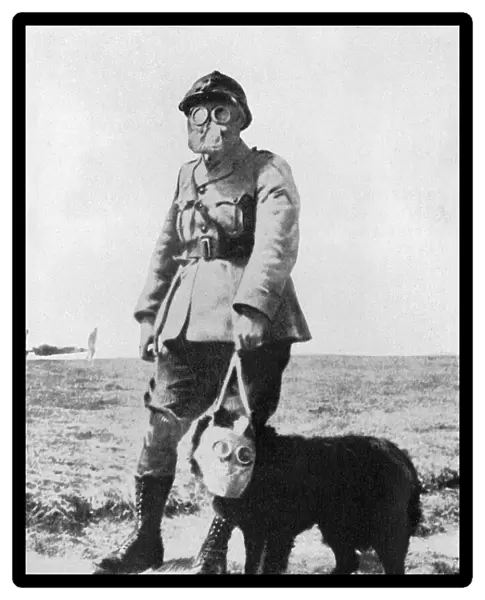Dog and Handler wearing gas masks at the battle front