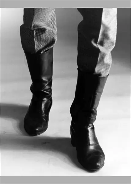 BOOTS. The boots someone is wearing. Date: late 1960s