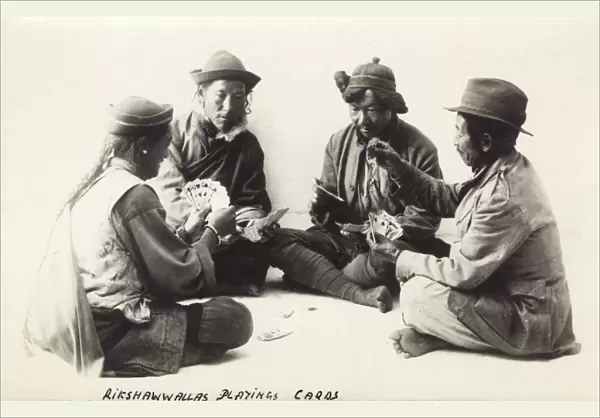 Four Bhutani Rickshaw Drivers playing cards