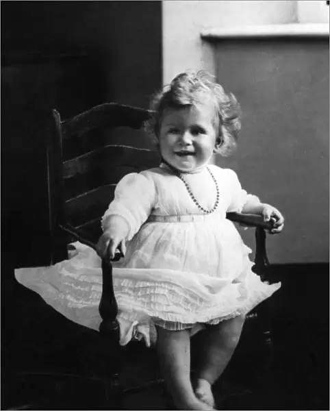 Princess Elizabeth of York sits in a high chair
