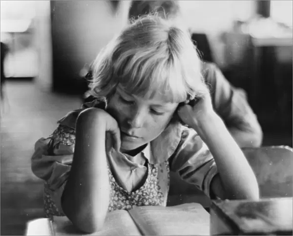 Child studying in school, Southeast Missouri Farms