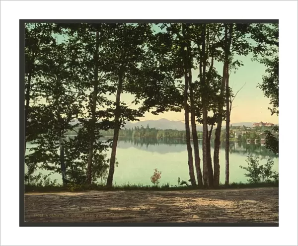 A glimpse of Mirror Lake, Adirondack Mountains