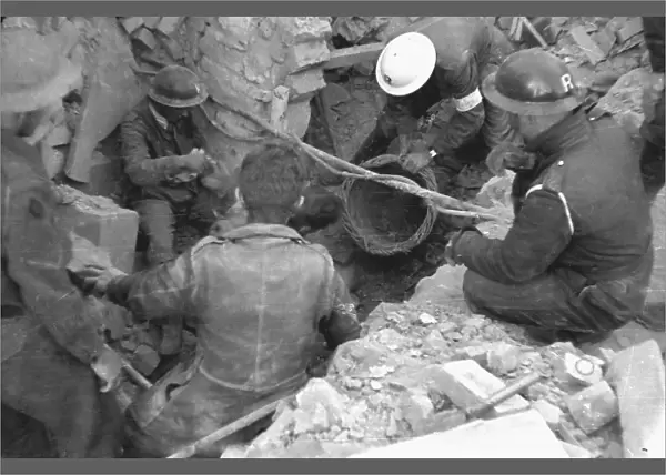 Blitz in London -- rescue workers searching debris, WW2