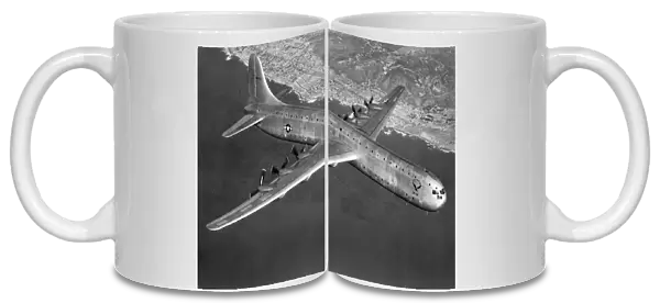 Convair XC-99 cruising along the Californian coastline