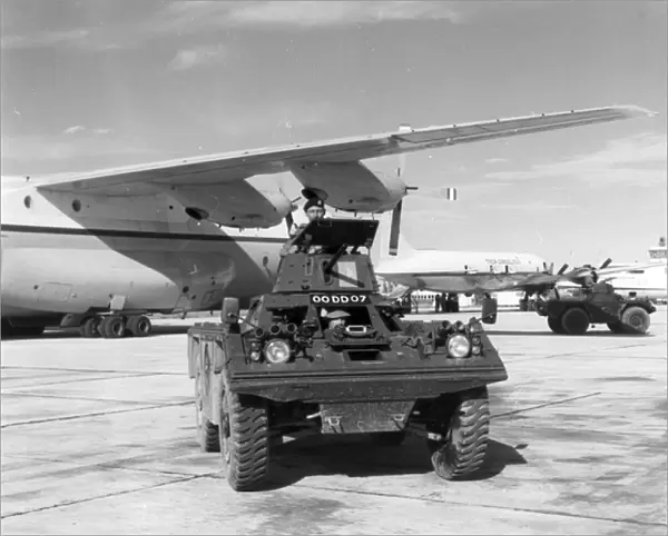 A Ferret armoured scout car at Belize with a RAF Short SC-5