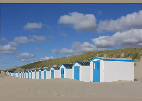 13132642. Colourful huts at the beach - island of Texel - Netherlands Date