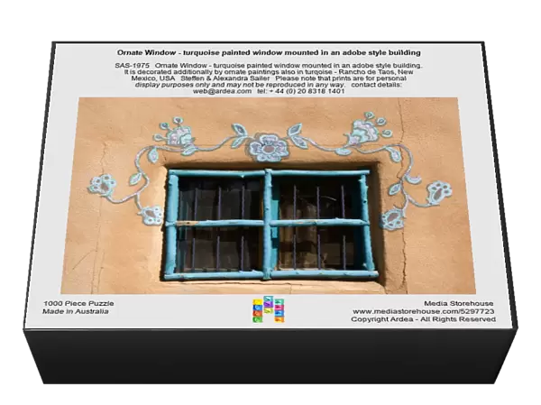 Ornate Window - turquoise painted window mounted in an adobe style building. It is decorated additionally by ornate paintings also in turqoise - Rancho de Taos, New Mexico, USA