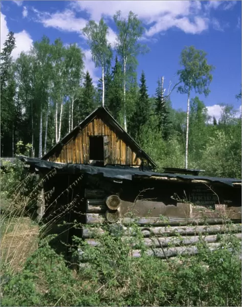 Abandoned hut of a forest keeper on river Negustyah bank (typical siberian log-hut), a tributary of river Bolshoi Ugan, near Ugut settlement; Uganskii Nat. reserve, Siberia, Russia; spring Ug37. 1153