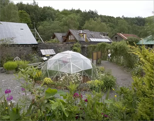 Centre for Alternative Technology, UK - situated in an old slate quarry at Machynlleth in Mid-Wales the centre demonstrates a wide range of sustainable systems. This image shows a greenhouse, low energy house and photovoltaic roof