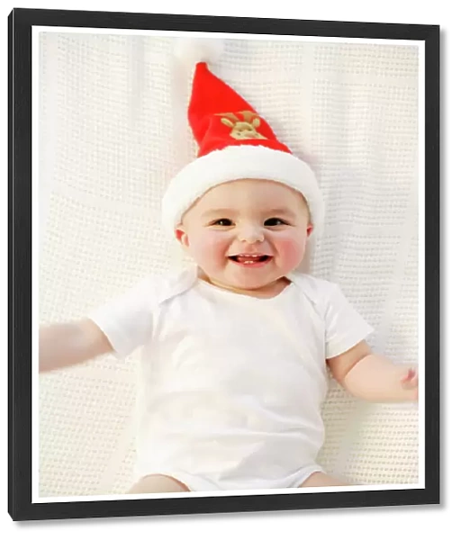 Baby boy. MODEL RELEASED. Baby boy. Nine month old boy wearing a Christmas hat