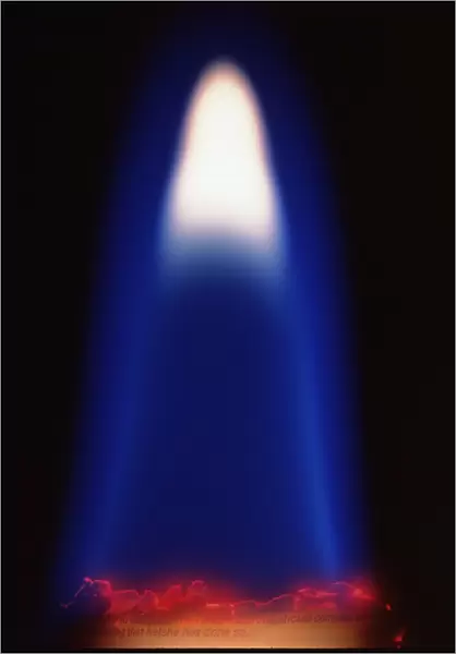 Close-up of a flame from a sheet of paper