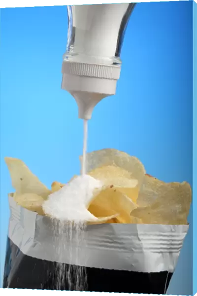 Salt content in crisps, conceptual image