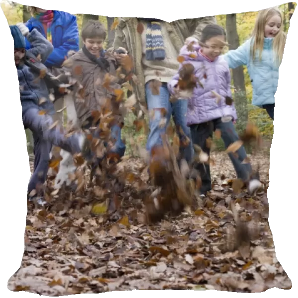 Parents and children playing in a wood