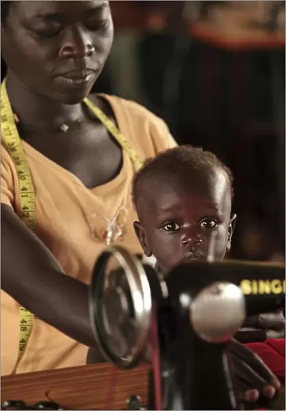 Working mother and child, Uganda