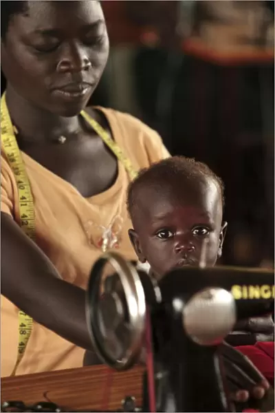 Working mother and child, Uganda