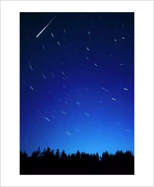 Time-exposure showing meteor track & star trails