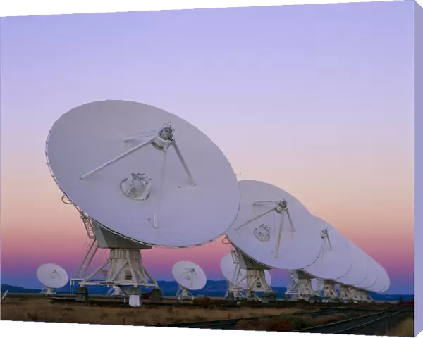 Very Large Array (VLA) radio antennae at dusk