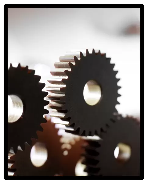 Cogs. Cogs are used in machines to change the direction and speed of rotational motion