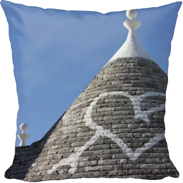 Heart painted on roof of traditional trullo in Alberobello, UNESCO World Heritage Site, Puglia, Italy, Europe
