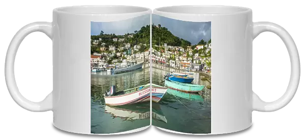 Little motoboat in the inner harbour of St. Georges, capital of Grenada, Windward Islands, West Indies, Caribbean, Central America