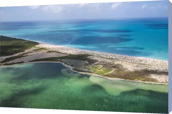 Aerial view of a corner of Barbuda, the Frigate Bird Sanctuary touches a thin strip