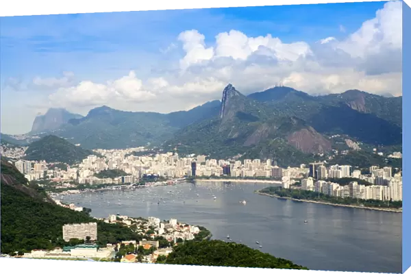 Aerial view of the city and Serra da Carioca mountains with Botafogo Bay, Corcovadao