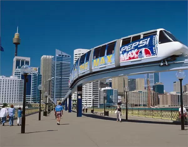 The Monorail at Darling Harbour with the city skyline beyond, Sydney, NSW