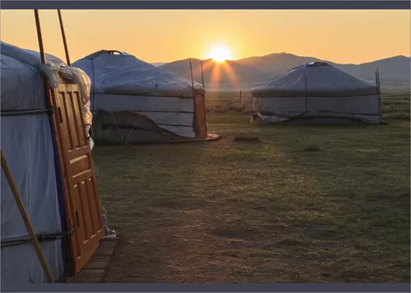 Sunrise over gers in summer, Nomad camp, Gurvanbulag, Bulgan, Northern Mongolia, Central Asia