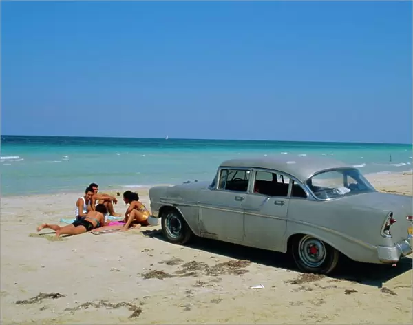1950s American car on the beach, Goanabo, Cuba, Caribbean Sea, Central America