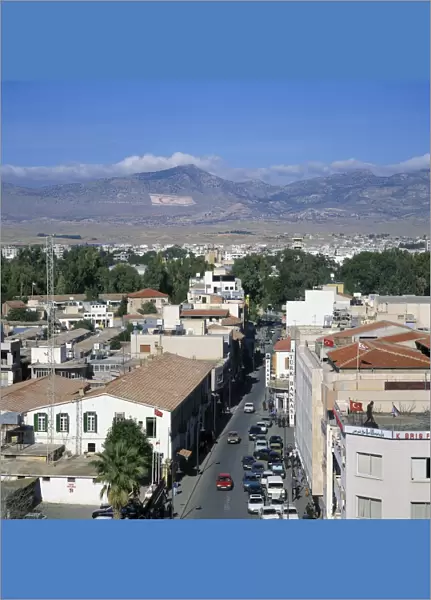 Street and rooftops of Turkish Cypriot North Nicosia with Kyrenia mountains in distance