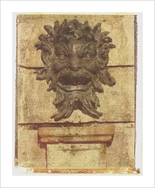Polaroid Image Transfer of water fountain in form of cast bronze face, England