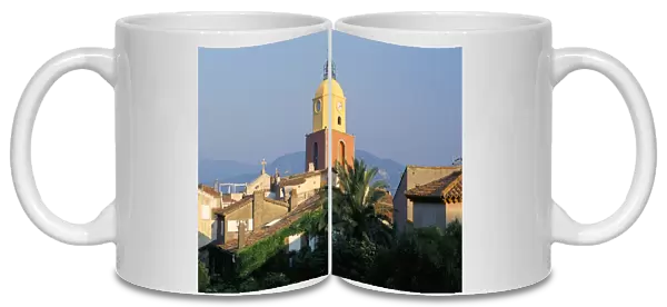 View to church across rooftops in early morning, St. Tropez, Var, Cote d Azur