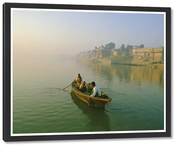 Waterfront and boat on the River Ganges (Ganga)