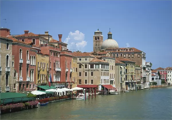 Houses and cafes on the Grand Canal and San Geremia church