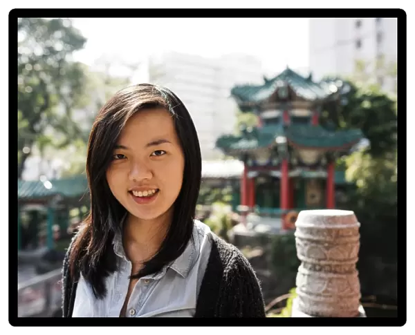 Portrait of young woman, Wong Tai Sin Temple, Kowloon, Hong Kong, China, Asia